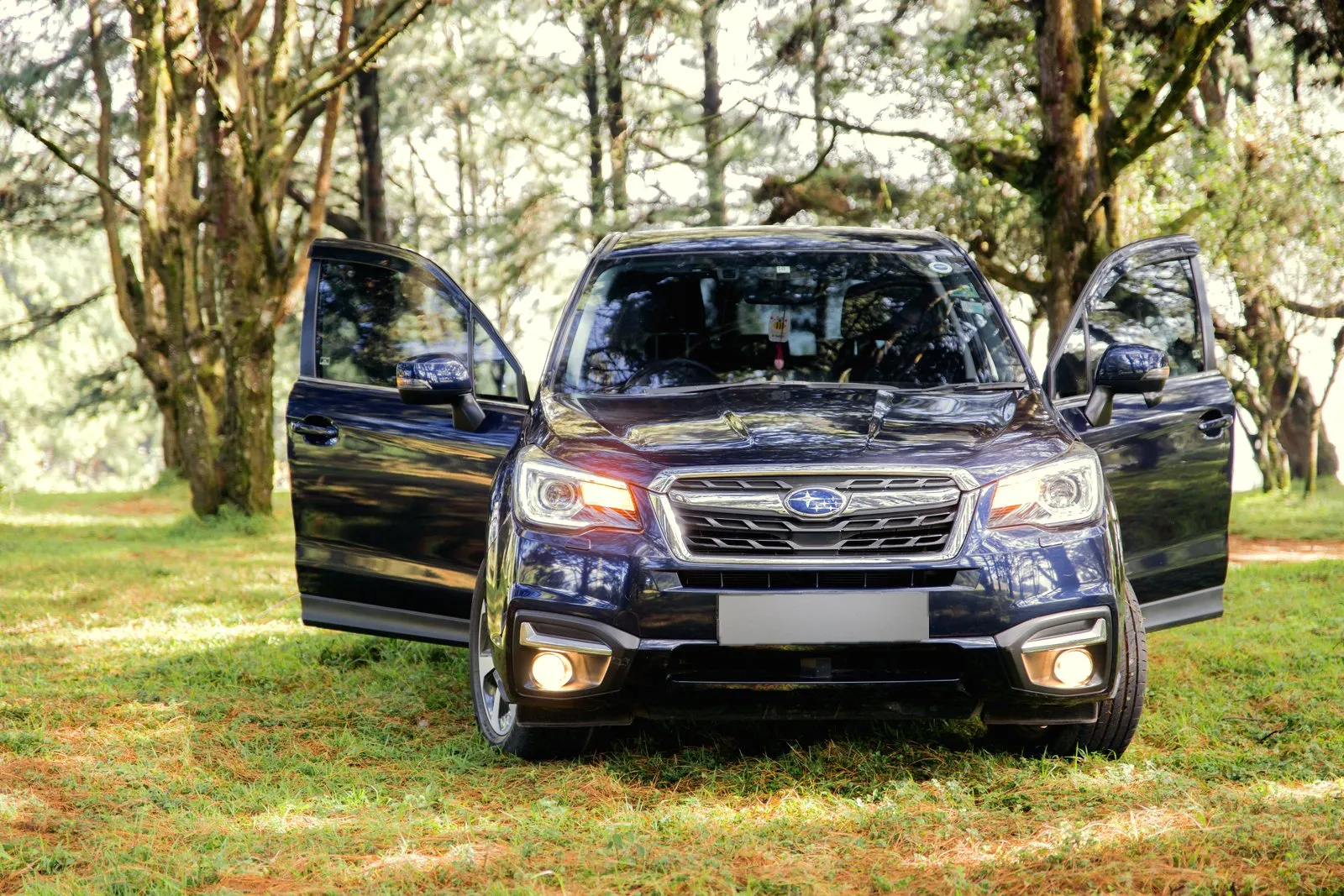 Subaru Forester with its doors open and the welcome bag on the seat